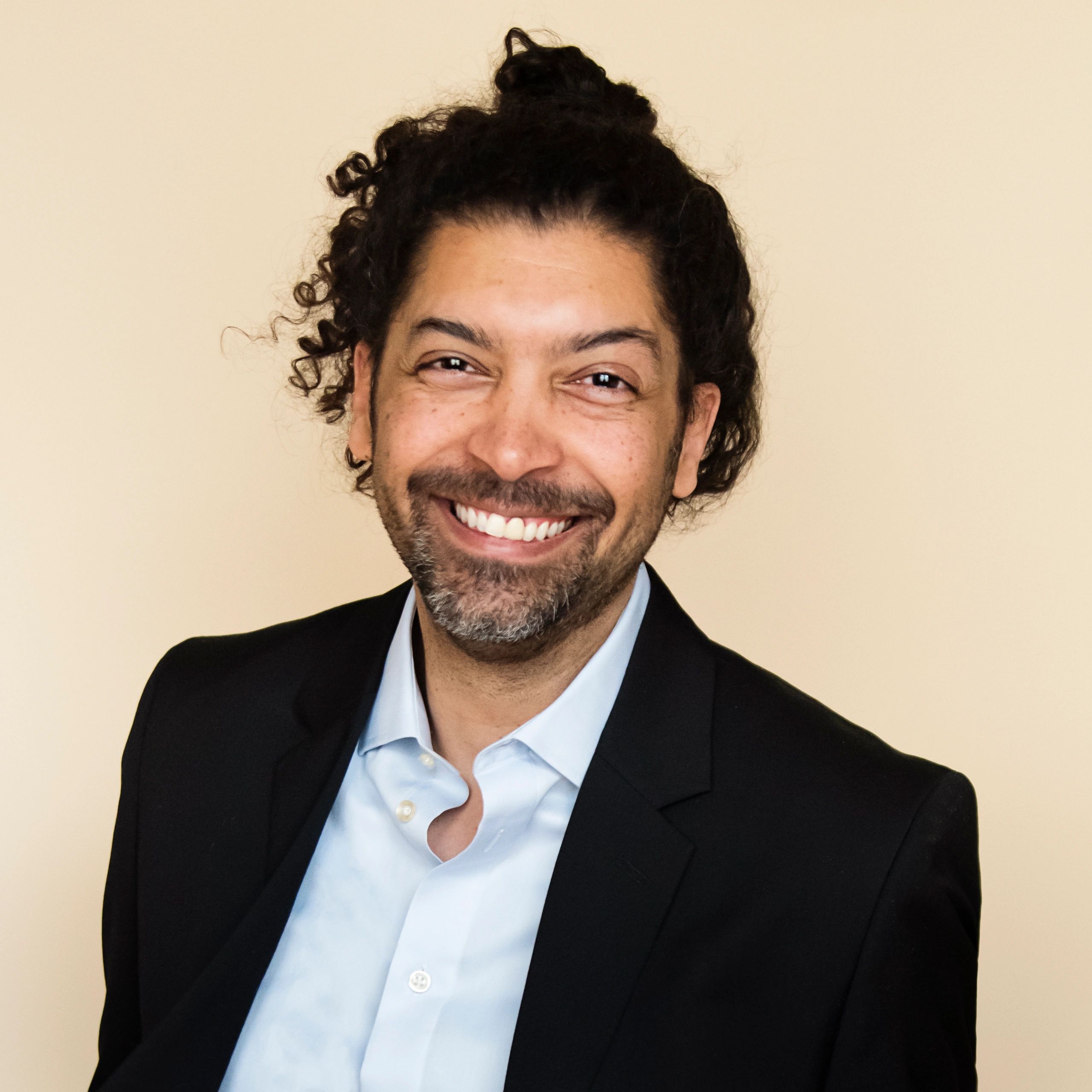 Editorial-style headshot used as testimonial author image